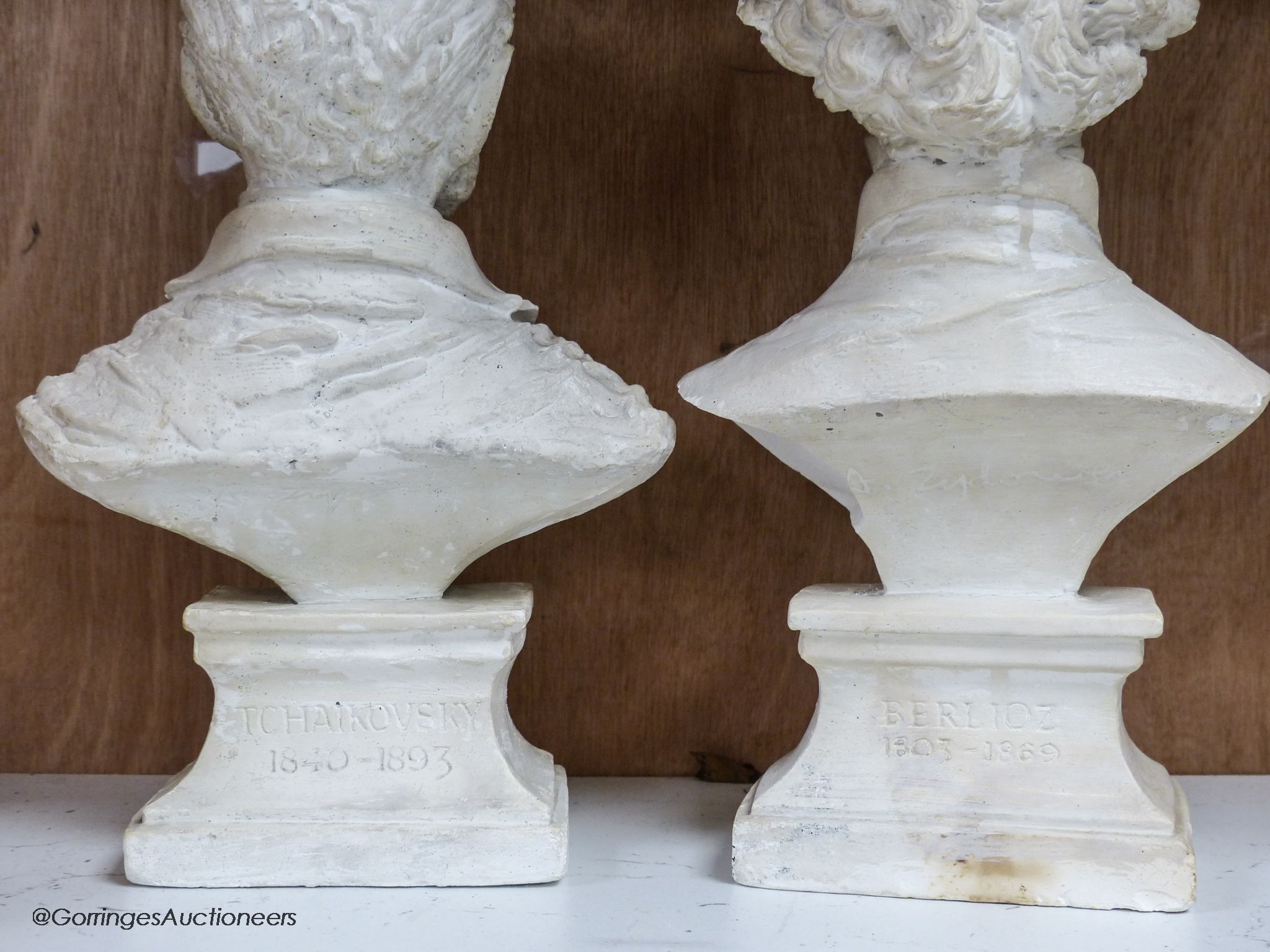 Five composition or ceramic busts of composers